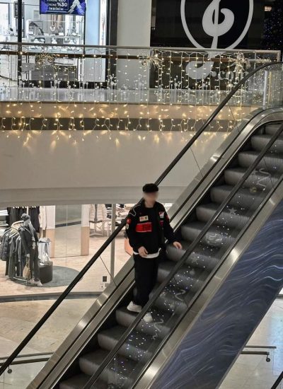 Front view of premium black Ferrari racing jacket unisex